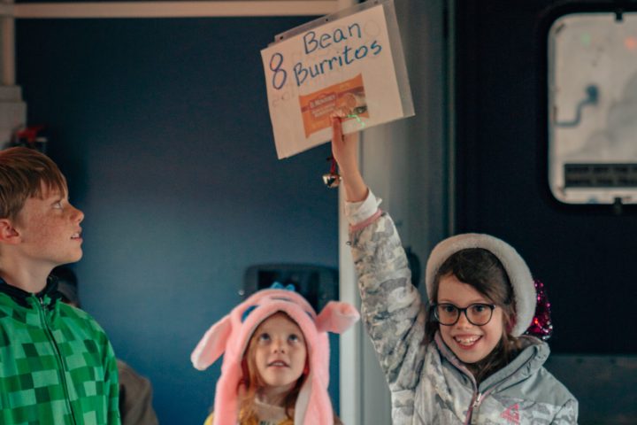 a group of people standing in a room