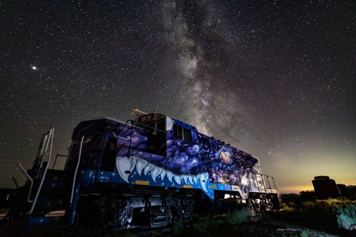 a train on the tracks at night