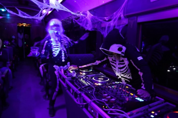 people playing instruments on a stage