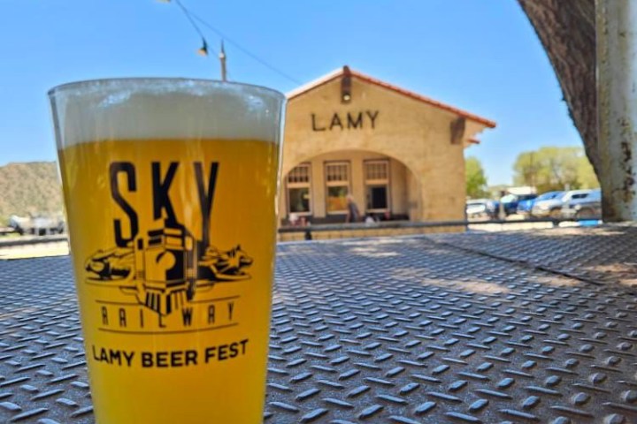 a cup of beer on a table