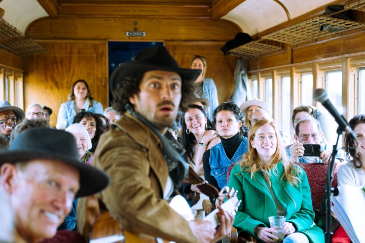 a group of people looking at the camera